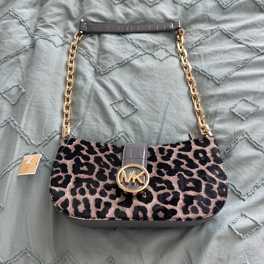 Michael Kors purse. Never used — tags still on!